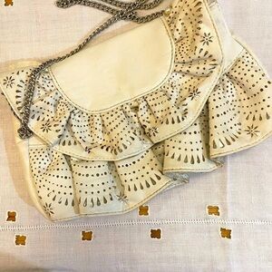 Little white soft ruffled embellishment with silver chain